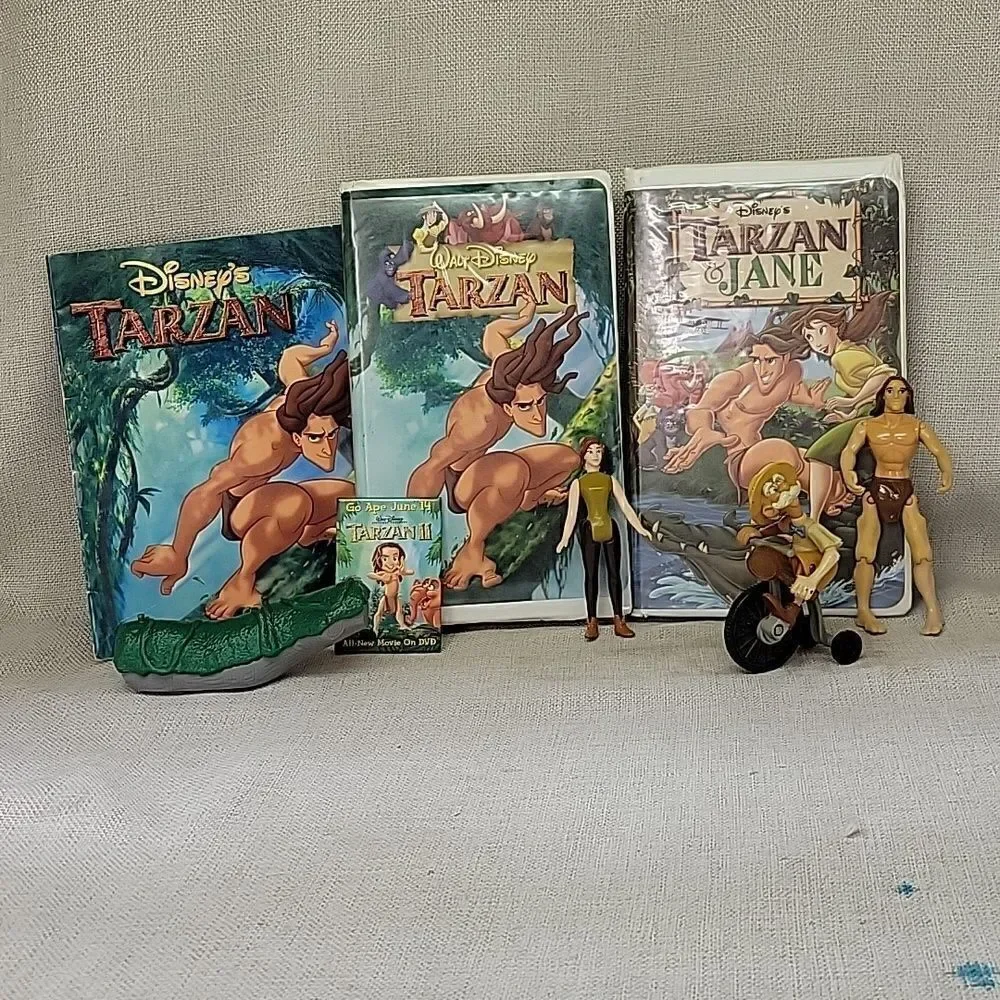 Disney Tarzan and Tarzan & Jane vhs movies, Tarzan figure,book other figures